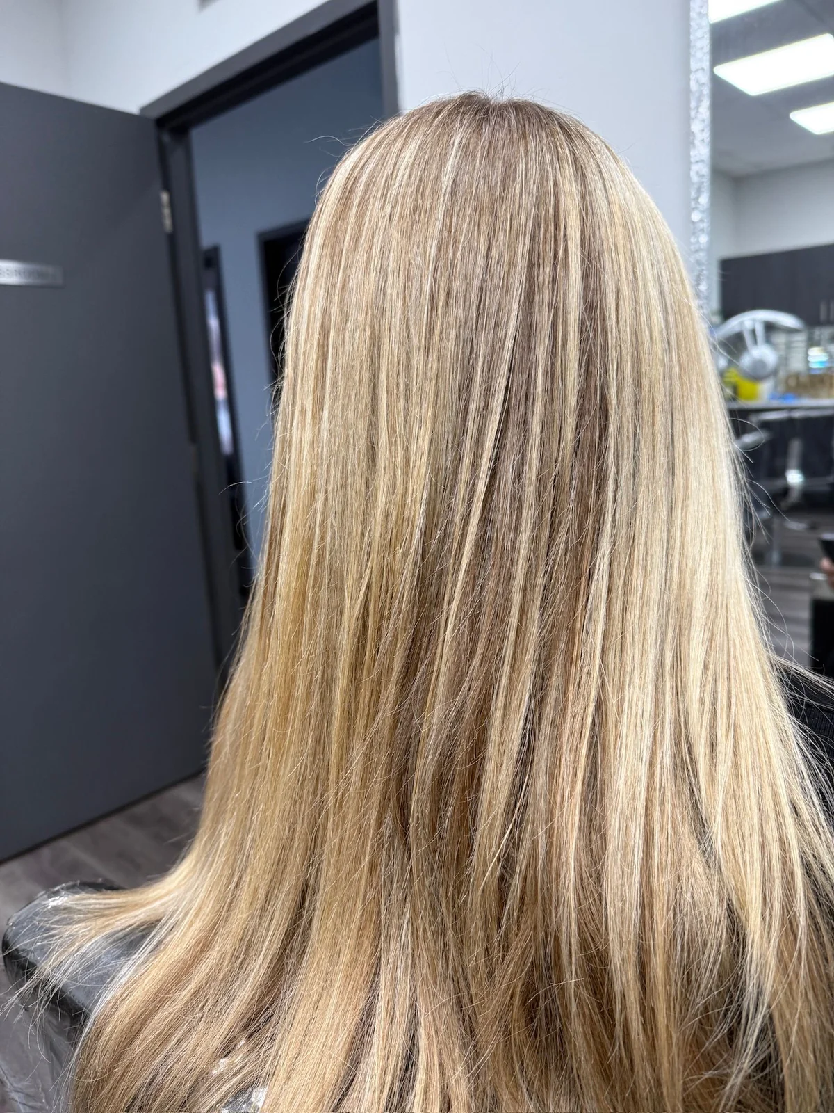 Long blonde hair with softly blended highlights